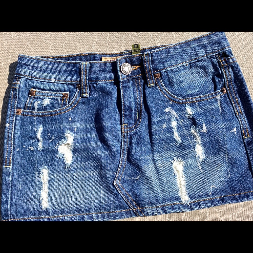 Stressed denim mini skirt
